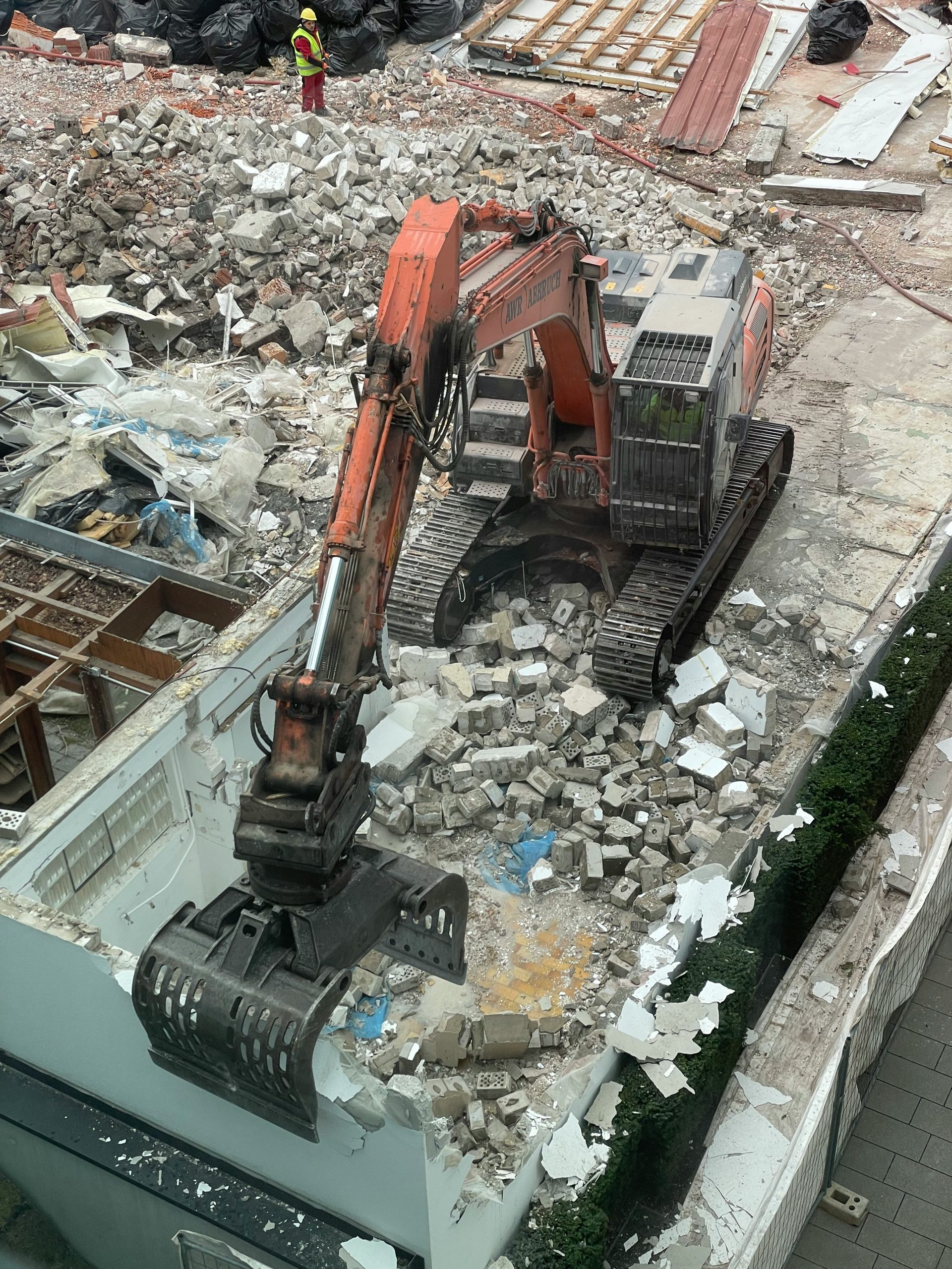 a construction site with a large machine in the middle of it